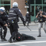 PHOTO OLIVIER PONTBRIAND, LA PRESSE -- Sur cette photo;Des protestataires contre le grand prix de formule un de montreal tentent de perturber les activités de la formule 1- 30 - section Photo reference #533054